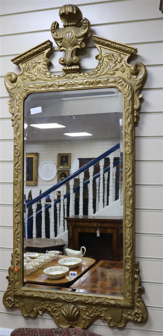 A Georgian style gilt frame broken arch wall mirror, H.135cm